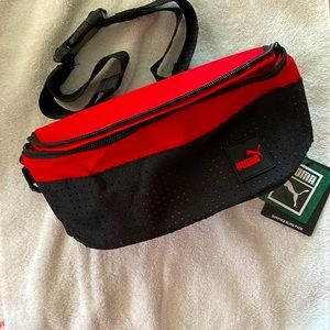 NWT Puma Surface Sling Pack in red. Adjustable waist strap.